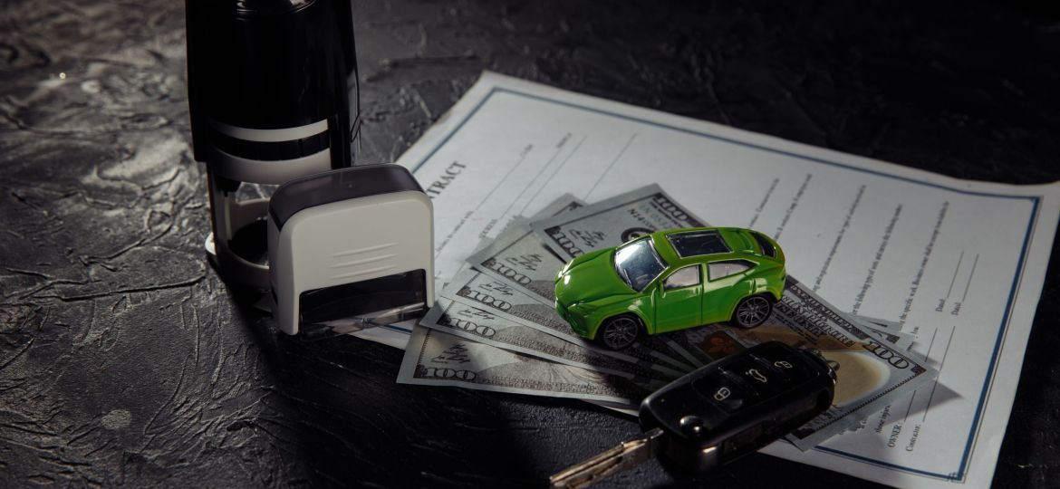Purchase contract for a car with stamps, keys and toy car