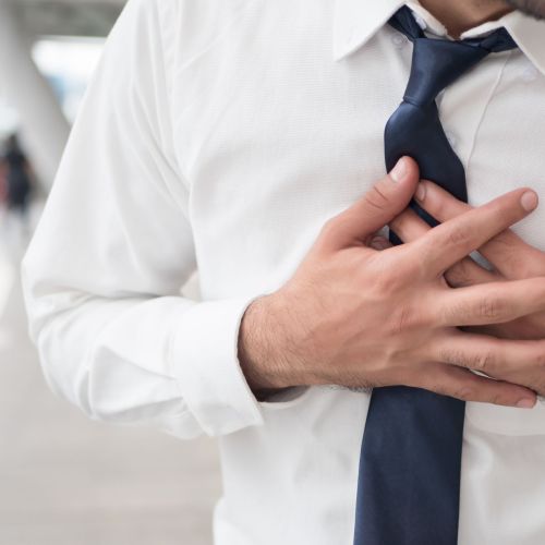 sick asian man suffering from heart attack, seisure